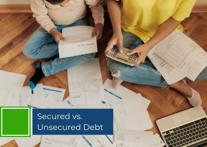 Couple looking at their debt documents